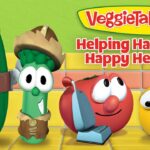 VeggieTales characters—accompanied by a cucumber, a corn cob with a hat, a red tomato, and a yellow bald globe with a broom, in a bright tiled scene with 'Helping Hands & Happy Hearts' text.