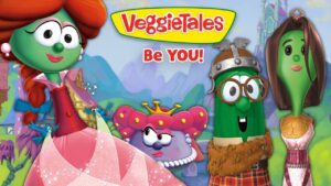 Bright VeggieTales scene with colorful veggie characters and a castle; banner reads 'VeggieTales Be YOU!'