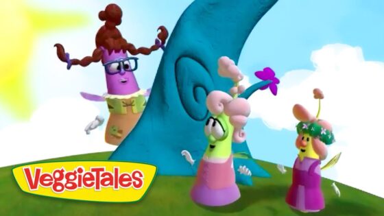 Colorful VeggieTales characters stand on a grassy hill beside a blue spiraled tree under a bright sky with a sun on the left.