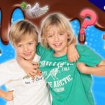 Two smiling boys with arms around each other in a colorful, Bible-themed thumbnail for a kids' video.