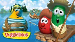 Three VeggieTales characters—a yellow veggie, a red tomato, and a green cucumber—stand on a wooden raft on a lake with a small guitarist boat in the background; trees and sky visible behind.