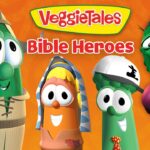 VeggieTales Bible Heroes cover featuring four animated vegetable characters against an orange background.