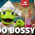 Thumbnail for a kids' show: green puppet with a newspaper hat labeled 'CAPIN' points at the camera, with a girl and a plush bunny in a colorful set; bold 'TOO BOSSY?' text and show logos in corners.