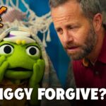 Thumbnail for Brave+ video: green puppet Iggy under a blanket beside a concerned man, caption 'CAN IGGY FORGIVE?'