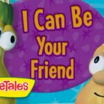 Two VeggieTales characters (a green veggie and an orange veggie) smile beside a purple circle that reads "I Can Be Your Friend."