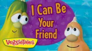 Two VeggieTales characters (a green veggie and an orange veggie) smile beside a purple circle that reads "I Can Be Your Friend."