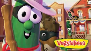 Three cheerful cartoon vegetables in a Western town with a colorful VeggieTales logo in the foreground.