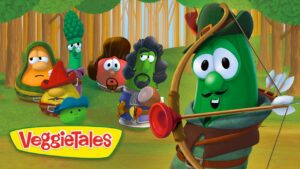 Green veggie archer aiming a bow in a forest, VeggieTales logo at bottom left, group of humanoid vegetables watching.