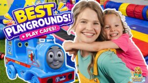 Smiling woman with a young girl hugging her on a colorful playground with a blue toy train and bold 'Best Playgrounds' text—video thumbnail.
